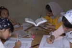 کتابت قرآن کریم با حضور کودکان و نوجوانان در نی ریز